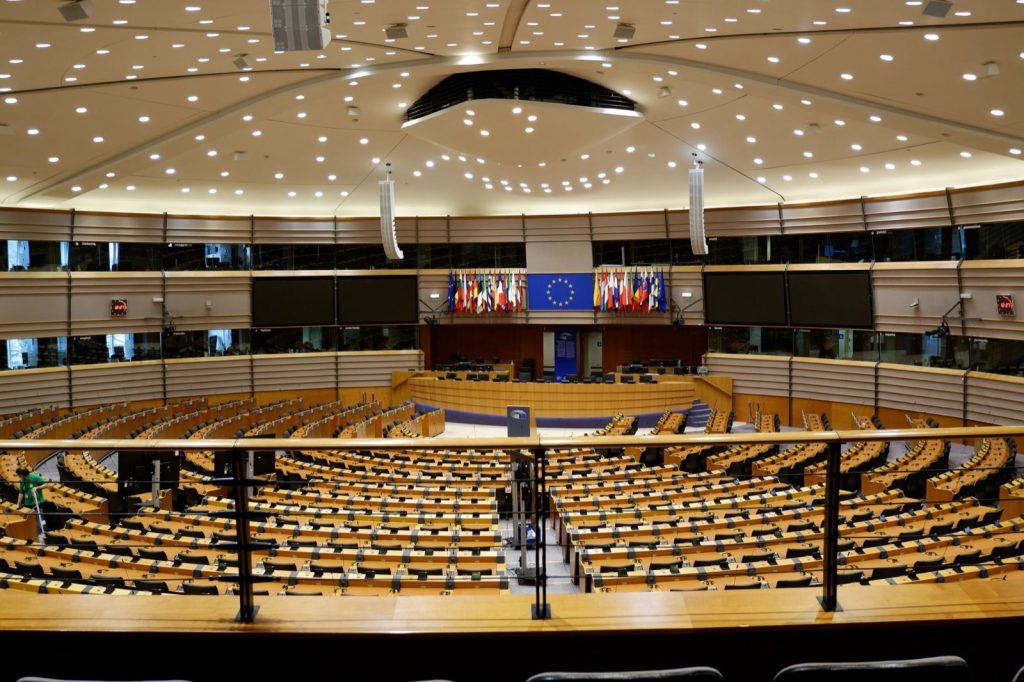 The empty hemicycle of the European Parliament seen from the upper gallery